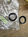 New Genuine Two Mercedes 350SL R107 380SL Plastic Ring Bushings 1076880097. Fixed Price $48.00.